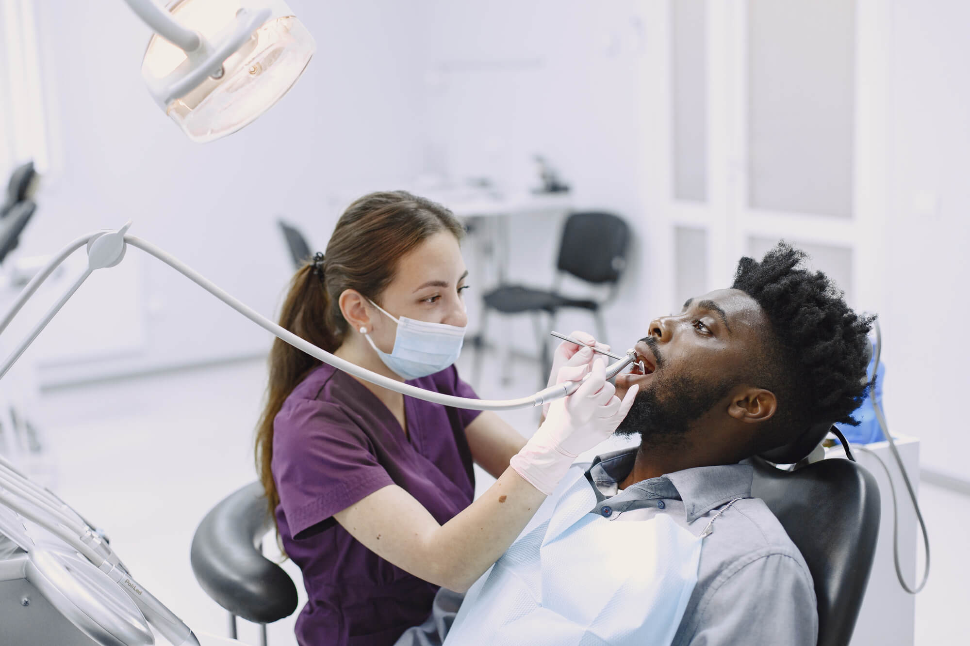 Man at the dentist for an Oral Consultation in Gainesville