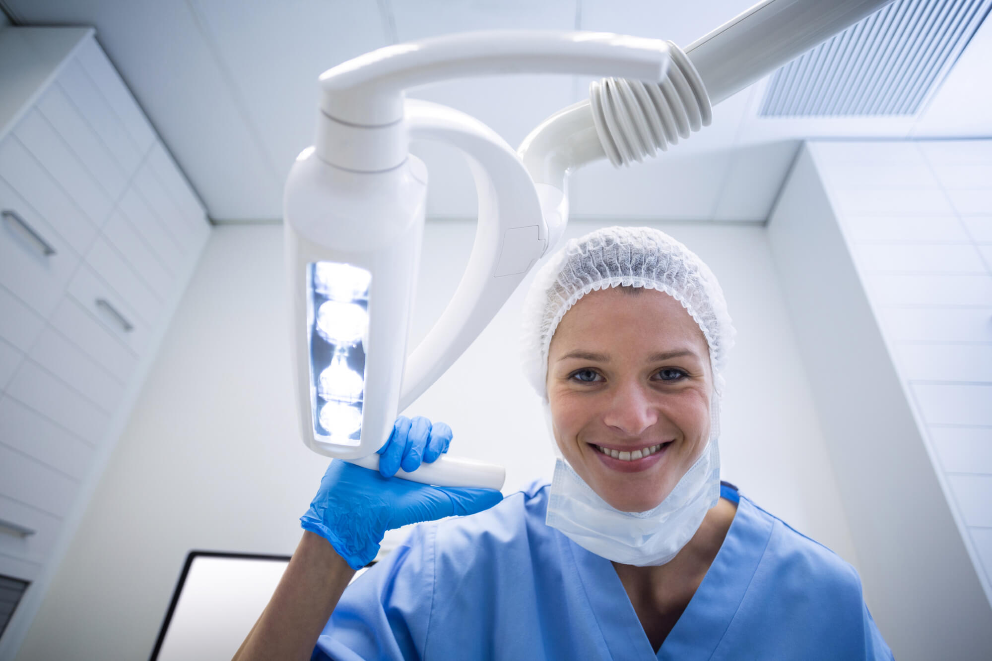 oral surgeon smiling before Dental Surgery 75075