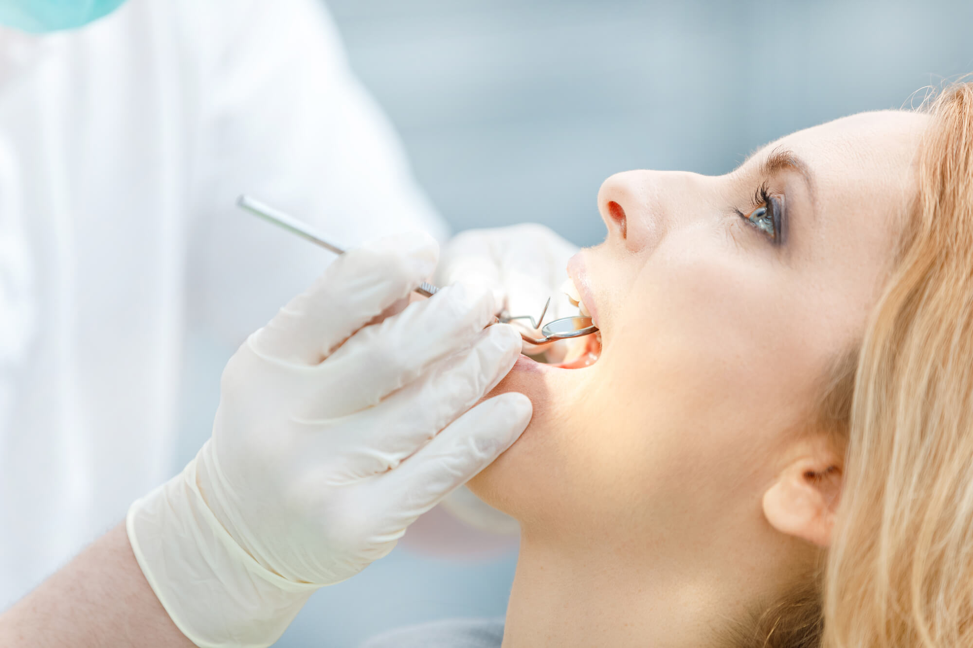 Oral surgery for patient by an Oral Surgeon in 76210